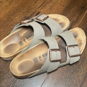 Birkenstock Arizona Two-Strap Sandals in Green with Copper Buckles